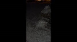Phone User Takes a Tumble in the Snow