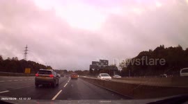 DASHCAM - Reckless driver of MacKoy van dangerously overtakes lorry, then brakes, to exit motorway!