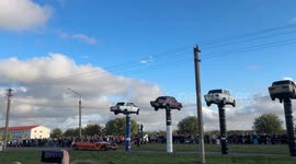 Limousine Knocks Down Car Towers