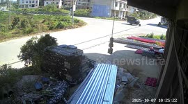 White SUV spins and falls into embankment hole after collision in Hunan, China