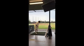 Golfer loses grip of club during swing in Australia