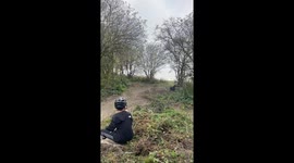 Boys crash during muddy bike ride in Oxford, England, UK