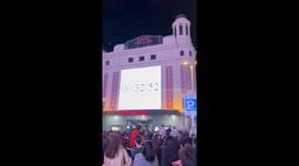 Fans gather in Callao Square for Rosalía’s surprise countdown in Madrid, Spain