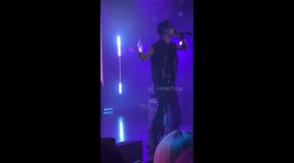 Rock and roll over! Hapless singer slips and falls off stage