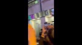 Rosalía waves to fans after surprise album announcement in Callao, Madrid, Spain