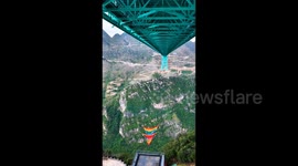 Dare to try bungee jumping from 625-metre tall bridge WITHOUT a rope?