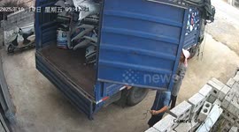 Piled sacks fall from truck causing near accident in Guangxi, China