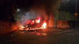 Van on fire after violent clashes erupt outside Dublin hotel housing asylum seekers