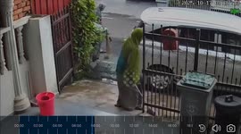 Mothers begin fighting with brooms and leaf blowers outside their homes