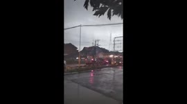 Train crashes into truck stuck on level crossing in Indonesia