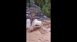 Pickup truck caught in raging flood amid heavy rain in southern Thailand