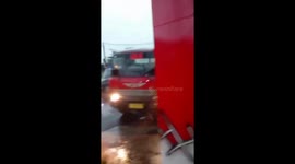 Train crashes into lorry stuck on level crossing in Indonesia