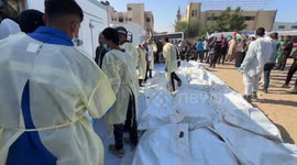 Funeral held for 54 unidentified Palestinians returned by Israel under cease-fire deal
