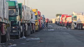 Limited humanitarian aid trucks continue entering Gaza under ceasefire deal