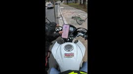 By a Thread: Kite Line Nearly Causes Fatal Accident on Busy Avenue