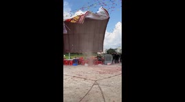 Wind causes chaos at wedding as tent blown upside, guests forced to cling on