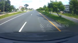 Driver slams brakes to avoid wayward tuk tuk veering across lanes