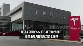 Tesla Shares Slide After Profit Miss Despite Record Sales