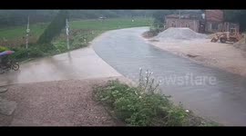 Motorcycles collide on rainy day in Guangdong, China