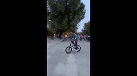 Man slips attempting bicycle jump in Jilin, China