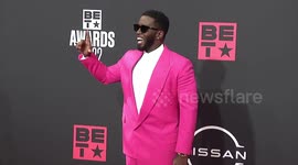 UNCAPTIONED: Sean 'Diddy' Combs 'woke up with a knife to his throat'