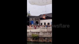 Performer Falls Into Lake After Balloon Malfunction During Aerial Show in Wuzhen, China