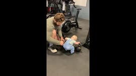 Baby mimics squats in gym—coach dad’s adorable training session hits 3M Instagram views