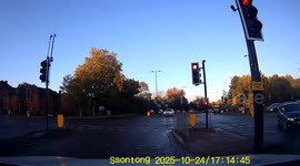 DASHCAM- Person on electric scooter jumps light and nearly hits car!