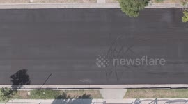 Neighbor Took the Car Out on Fresh Laid Tar