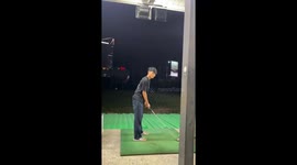 Golf club flies out of beginner's hand as he tries driving range for first time