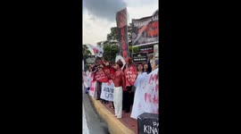 Youths dress up as devils and ghouls during anti-corruption rally