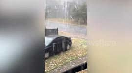 Golf ball-sized hail batters Queensland, thousands left without power
