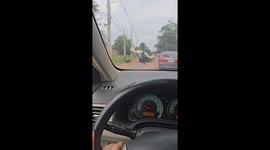 Drunk Motorcyclist Towing a Car