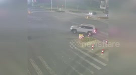 China: Bicyclist Trapped Under Vehicle After Being Run Over In Zhejiang