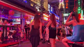 Thai strippers wear black dresses in show of grief for country's queen mother