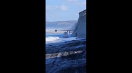 Rescuers’ all-terrain vehicle nearly swept into sea in Sakhalin, Russia