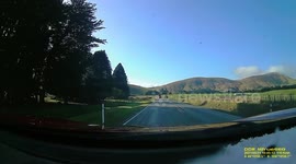 Tractor Has Near Miss With Car