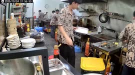 Kitchen worker slips, covers face in flour in Malaysia