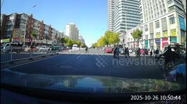 Elderly couple bumped by car while crossing pedestrian lane in Tianjin, China