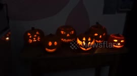 Halloween pumpkins glowing at Pumpkin Carving session in Refettorio Felix St Cuthberts Centre in London