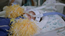 Babies in NICU don spooky outfits for Halloween