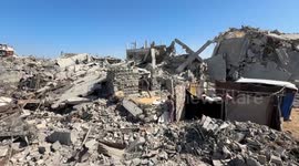 Palestinian man digs through rubble with bare hands for bodies in Gaza