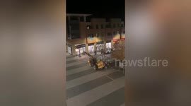 Shocking moment thieves use digger to rip cash machine out of shop