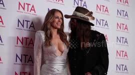 UNCAPTIONED: Elizabeth Hurley gives update on Billy Ray Cyrus romance