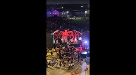 Fitness enthusiasts chased by zombies for Halloween fun run