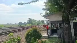 Train derails with hundreds of passengers onboard in Indonesia