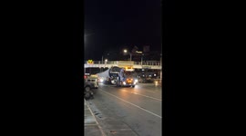 Huge windmill holds up traffic while being transported