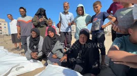 Bodies of 80 Palestinians reburied in central Gaza (2)