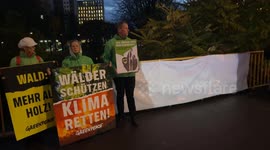 Greenpeace stages protest in Berlin urging stronger climate action