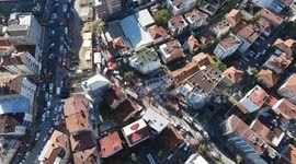 Türkiye: DRONE - Seven-story building collapses in Türkiye; rescue efforts underway for five trapped